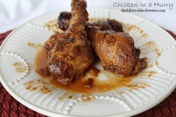 Chicken in a Hurry is a slow cooker chicken that has a great tangy base cooked till the meat falls off the bones! Prep time is minimal and the slow cooker does the rest! Chicken in a Hurry on a white plate