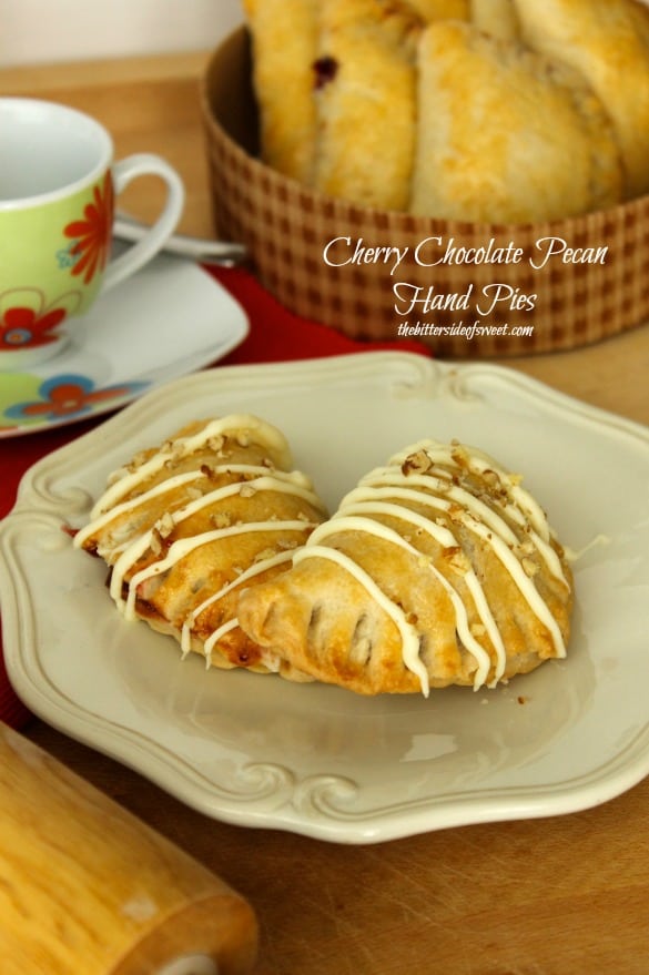 Cherry Chocolate Pecan Hand Pies | thebittersideofsweet.com #piday #dessert Cherry Chocolate Pecan Hand Pies | thebittersideofsweet.com #piday #dessert