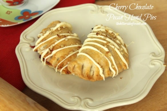 Cherry Chocolate Pecan Hand Pies | thebittersideofsweet.com #piday #desserts Cherry Chocolate Pecan Hand Pies | thebittersideofsweet.com #piday #desserts