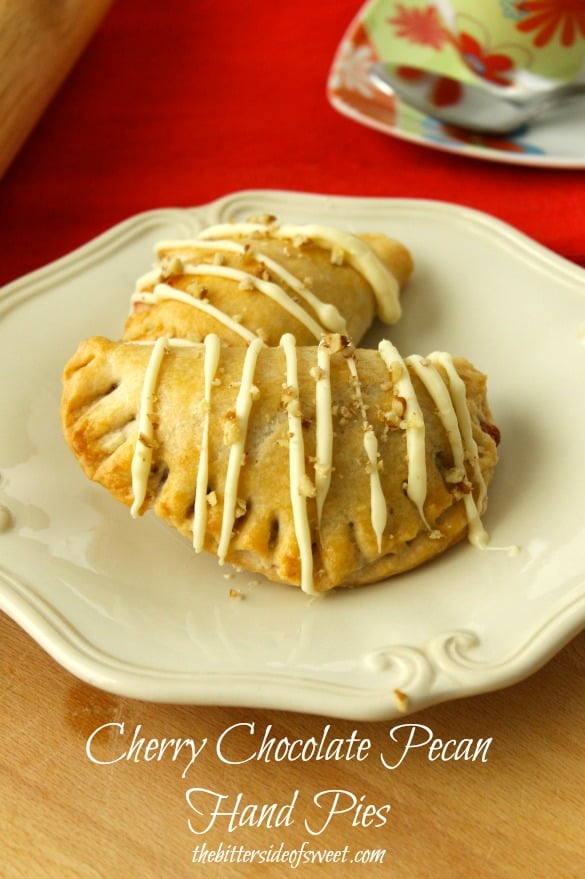 Cherry Chocolate Pecan Hand Pies | thebittersideofsweet.com #piday #desserts Cherry Chocolate Pecan Hand Pies | thebittersideofsweet.com #piday #desserts