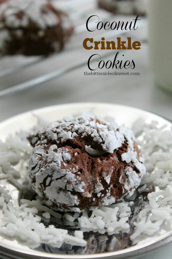 These Coconut Crinkle Cookies are a classic crinkle cookie recipe with the added flavor of coconut! Perfect for holiday baking! | The Bitter Side of Sweet #coconut #chocolate #cookies Coconut Crinkle Cookies - The Bitter Side of Sweet