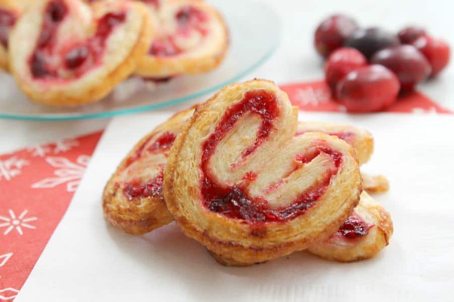Cranberry Palmiers are an elegant cookie made with puff pastry and a cranberry sauce. It will make a nice additional to your dessert table! | The Bitter Side of Sweet Cranberry Palmiers