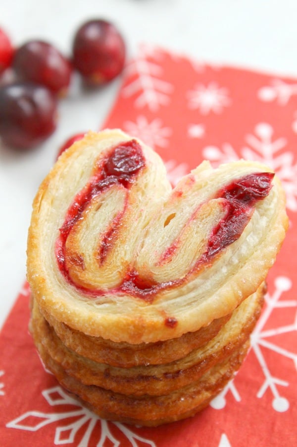 Cranberry Palmiers are an elegant cookie made with puff pastry and a cranberry sauce. It will make a nice additional to your dessert table! | The Bitter Side of Sweet Cranberry Palmiers