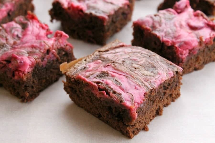 Rich, fudgy, thick brownies topped with a whipped cranberry cream cheese makes these Cranberry Cheesecake Brownies perfect! | The Bitter Side of Sweet Cranberry Cheesecake Brownies