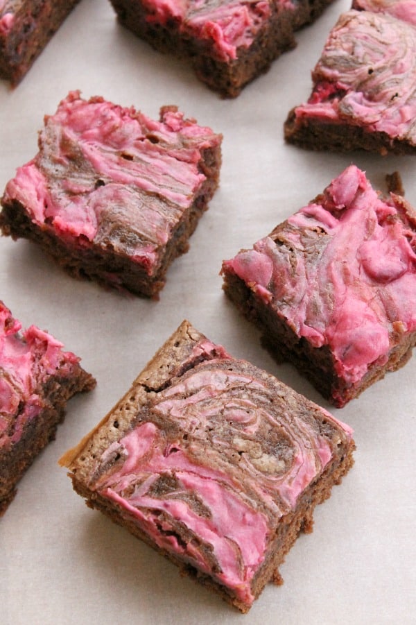 Rich, fudgy, thick brownies topped with a whipped cranberry cream cheese makes these Cranberry Cheesecake Brownies perfect! | The Bitter Side of Sweet Cranberry Cheesecake Brownies