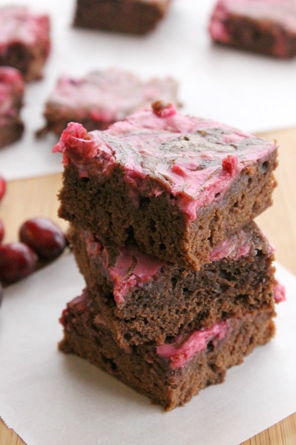 Rich, fudgy, thick brownies topped with a whipped cranberry cream cheese makes these Cranberry Cheesecake Brownies perfect! | The Bitter Side of Sweet Cranberry Cheesecake Brownies