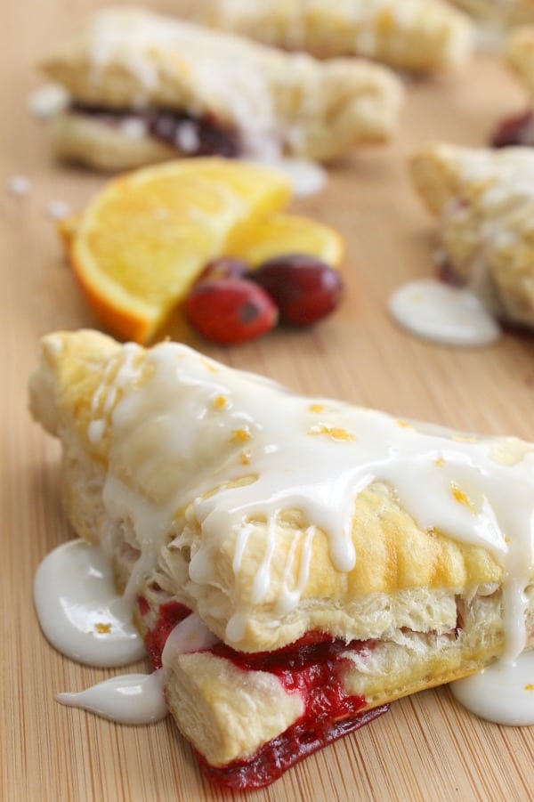 Start off your holiday breakfast with these Orange Cranberry Turnovers! A perfect combination of sweetness and a little bit of tart! | The Bitter Side of Sweet Orange Cranberry Turnovers