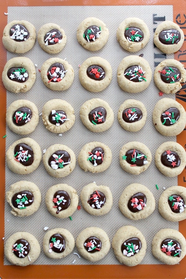 Chocolate Peppermint Thumbprint Cookies made with greek yogurt and whole white wheat flour with a chocolate ganache filling that is perfect for holiday baking! | The Bitter Side of Sweet #chocolate #peppermint #cookies Chocolate Peppermint Thumbprint Cookies | The Bitter Side of Sweet