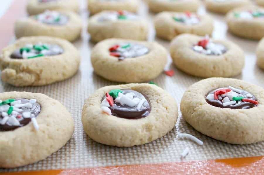 Chocolate Peppermint Thumbprint Cookies made with greek yogurt and whole white wheat flour with a chocolate ganache filling that is perfect for holiday baking! | The Bitter Side of Sweet #chocolate #peppermint #cookies Chocolate Peppermint Thumbprint Cookies | The Bitter Side of Sweet
