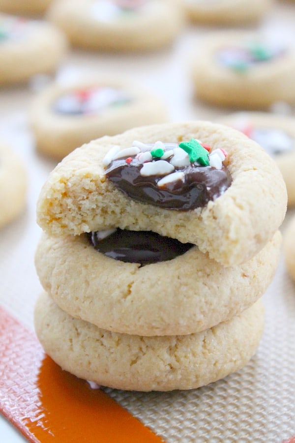 Chocolate Peppermint Thumbprint Cookies made with greek yogurt and whole white wheat flour with a chocolate ganache filling that is perfect for holiday baking! | The Bitter Side of Sweet #chocolate #peppermint #cookies Chocolate Peppermint Thumbprint Cookies | The Bitter Side of Sweet