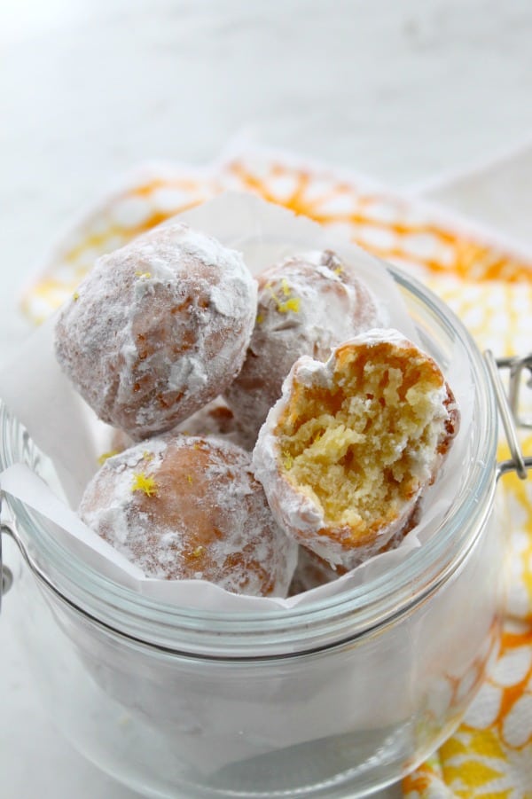 The best way to ring in Spring with with lots of citrus recipes including these Lemon Donut Holes! Lemon Donut Holes in glass jar