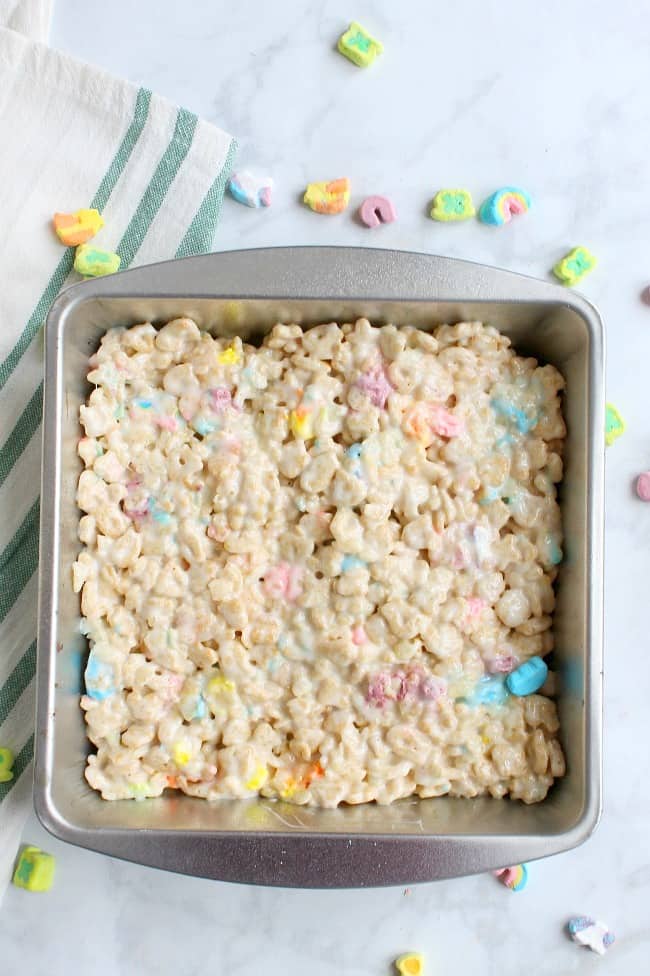 Lucky Charms has to be my kids all time favorite cereal. These Charm Treats are the new favorite in our house and they are teenager approved! Charm Treats in pan