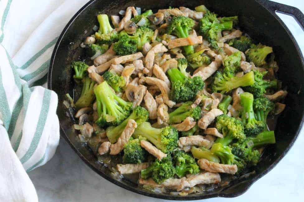 Broccoli Pork Stir Fry is a super quick meal to make! You can add it over rice and have dinner ready in less than 30 minutes! Broccoli Pork Stir Fry in skillet