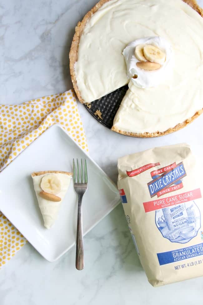 Banana Pudding No Bake Cheesecake has the flavors of a classic and the form of a cheesecake that you will love this dessert mash up! | The Bitter Side of Sweet #bananas #cheesecake #nobake Banana Pudding No Bake Cheesecake on a white plate