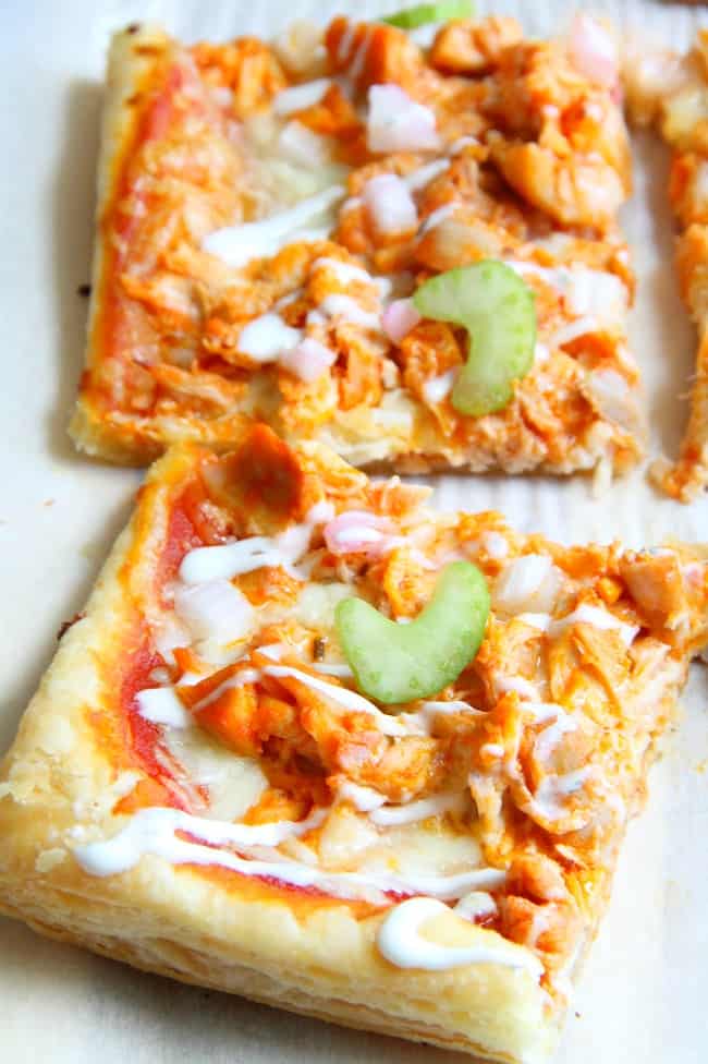 Buffalo Chicken Puff Pastry Pizza is the epitome of easy dinner. Grab a rotisserie chicken on your way home from work, you're gonna need it! | The Bitter Side of Sweet #puffpastry #chicken #buffalosauce #pizza Buffalo Chicken Puff Pastry Pizza