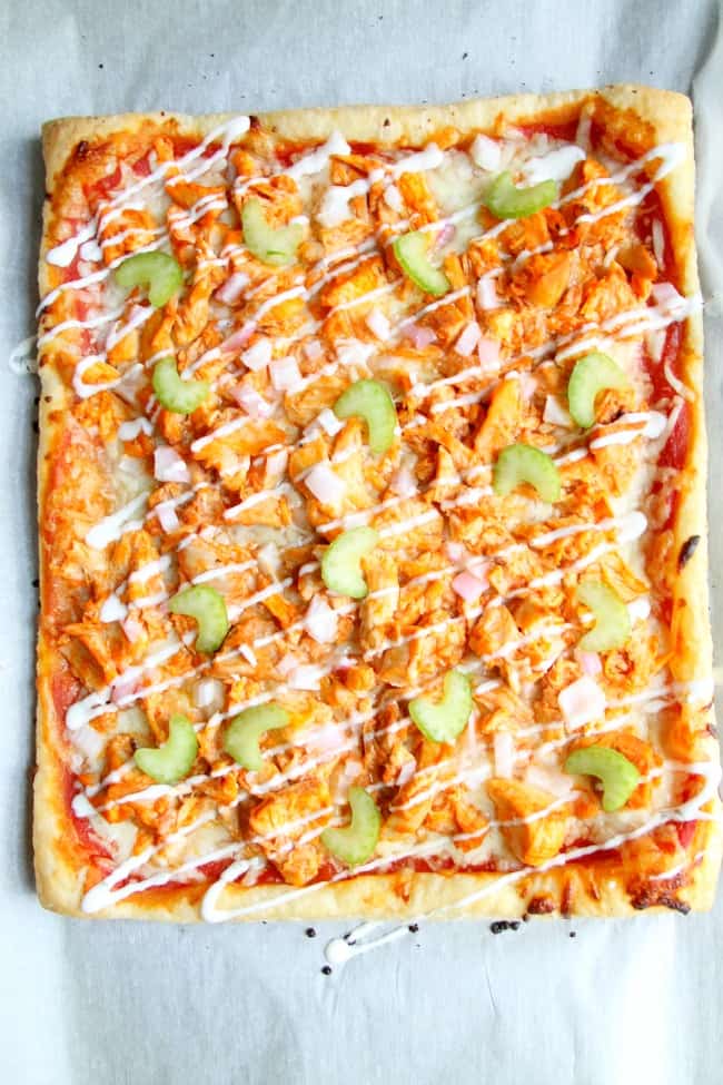 Buffalo Chicken Puff Pastry Pizza is the epitome of easy dinner. Grab a rotisserie chicken on your way home from work, you're gonna need it! | The Bitter Side of Sweet #puffpastry #chicken #buffalosauce #pizza Buffalo Chicken Puff Pastry Pizza