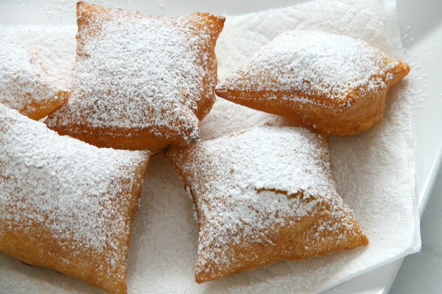 Puff Pastry Beignets are here for you when you're ready to let the good times roll. They don't have to just be for Fat Tuesday! Puff Pastry Beignets on white plate