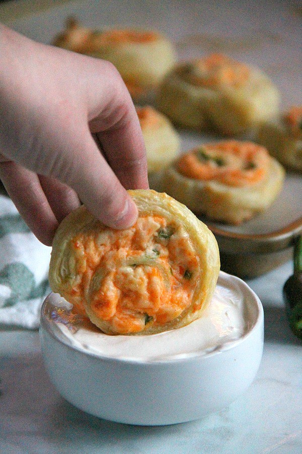 Puff Pastry Jalapeño Popper Pinwheels are just as ready for a game day as you are! They transport perfectly for tailgates. Puff Pastry Jalapeno Popper Pinwheels on white background