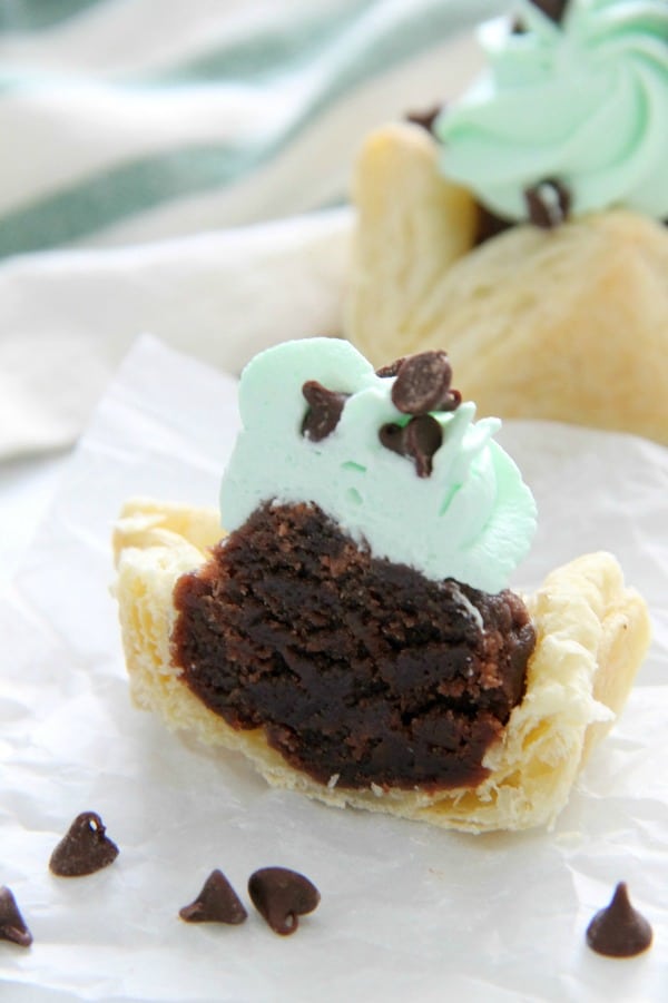 These Mint Chocolate Brownie Cups are a sweet addition to your next dinner party. Puff Pastry always adds a little bit of elegance to any dessert! Mint Chocolate Brownie Cups on white background