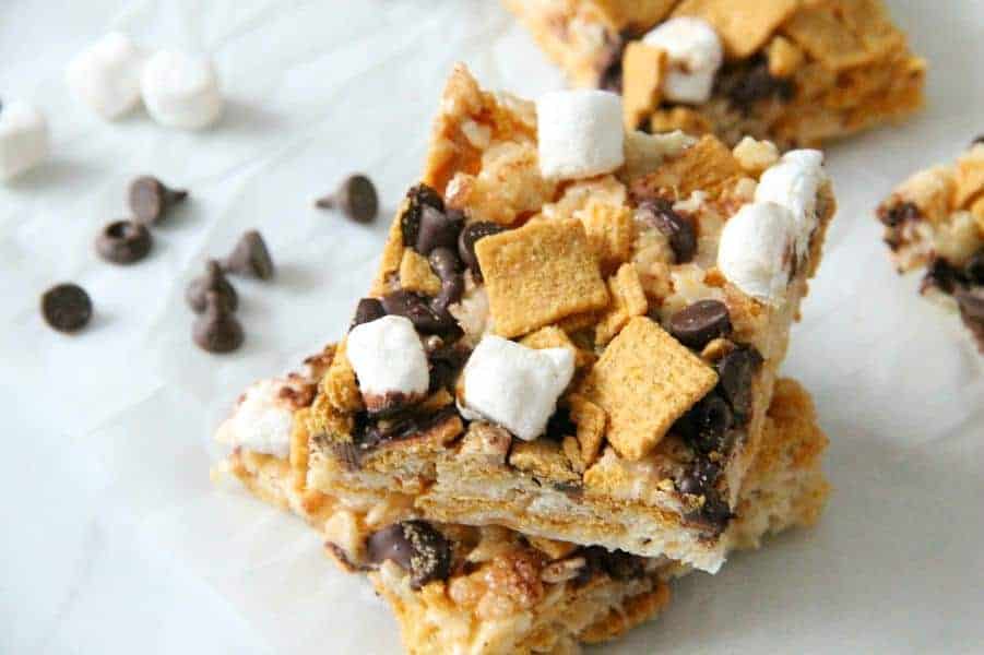 These S'mores Marshmallow Treats are such a fun summertime treat, especially when you do not have the convenience of a campfire! S'mores Marshmallow Treats on white background