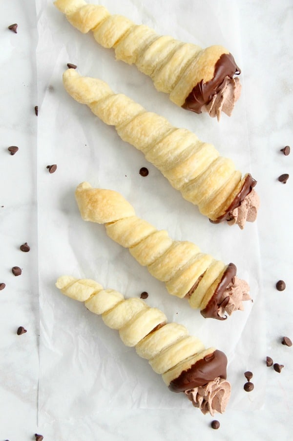 Chocolate Cream Horns are a sweet, delicate dessert for the chocolate lover in your life. You will love how easy they are! | The Bitter Side of Sweet Chocolate Cream Horns on white background