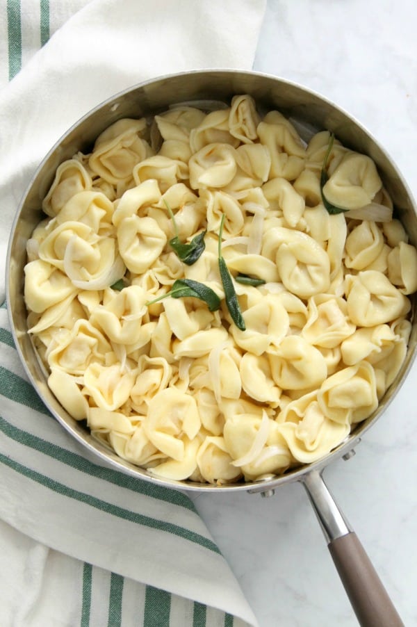 Tortellini with Butter and Sage is the easiest supper! Your family will love it! You can make it in minutes, but it's just so fancy. Tortellini with Butter and Sage in pan