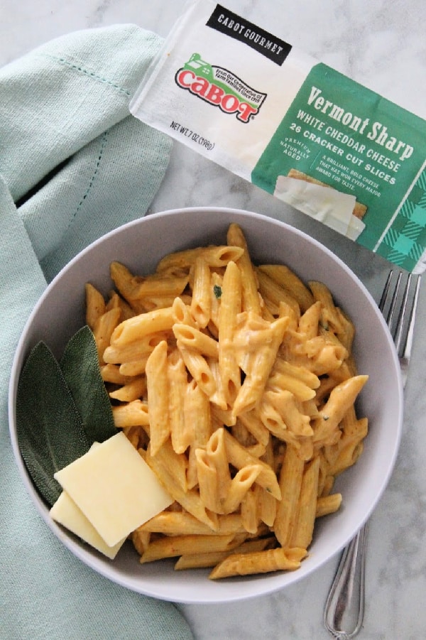 Creamy Pumpkin Pasta is perfect for a quick 30 minute meal! Made with pumpkin, sage and cream this pasta screams fall! You need this for your next dinner! Creamy Pumpkin Pasta in bowl