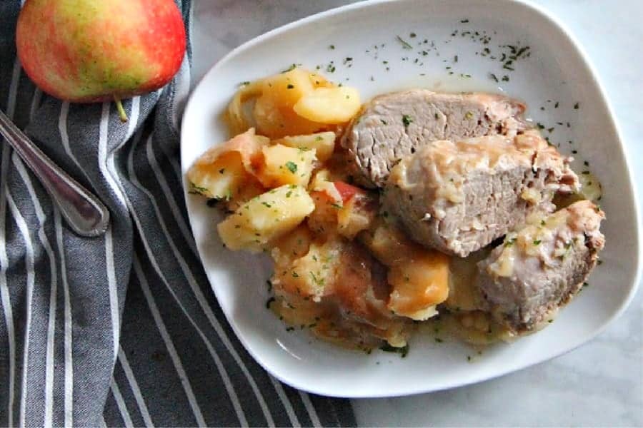 Instant Pot Pork Tenderloin with Apples and Onions | The Bitter Side of Sweet Instant Pot Pork Tenderloin with Apples and Onions on white plate