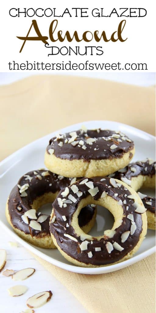 These Chocolate Glazed Almond Donuts are baked to perfect and topped with chocolate and almonds! They bake up in just about 10 minutes! | The Bitter Side of Sweet Chocolate Glazed Almond Donuts on white plate