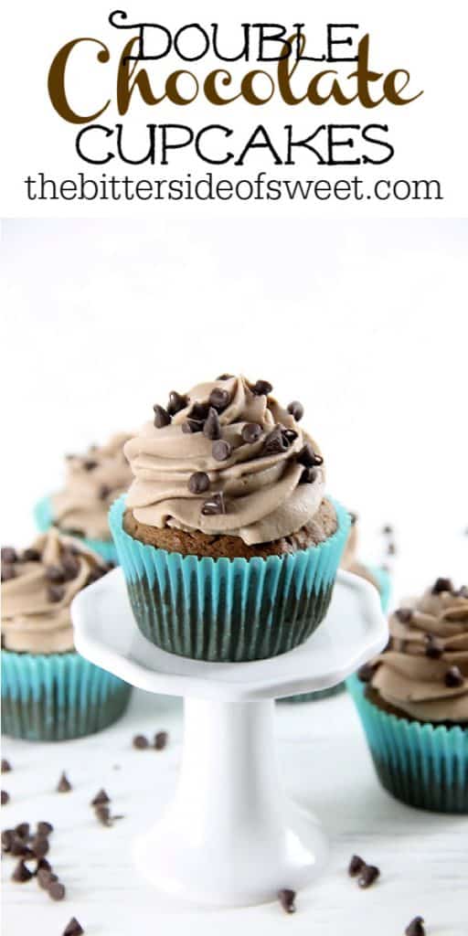 These Double Chocolate Cupcakes are filled with bits of chocolate on the inside and topped with a creamy chocolate frosting! Double Chocolate Cupcakes on white cupcake stand