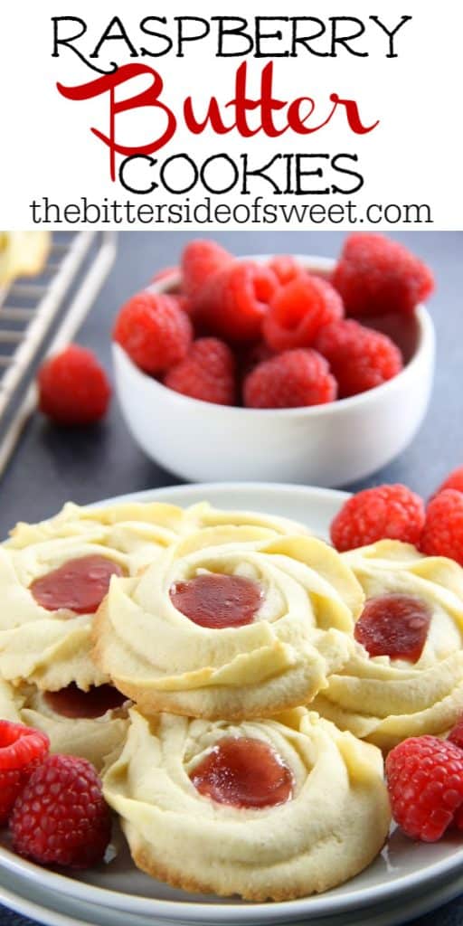 Raspberry Butter Cookies are sweet, simple, and perfect for gifting. Light, crisp butter cookies with a dollop of raspberry jam are great with a cup of tea! Raspberry Butter Cookies on plate