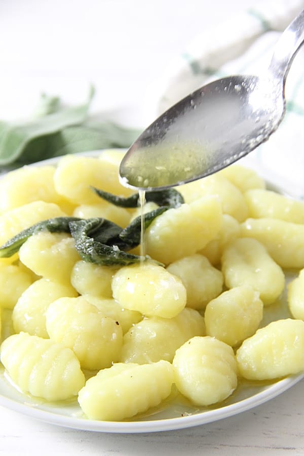 This Sage Butter Gnocchi is one delectable dinner. The sauce is made with a few simple ingredients! Cooks up in about 5 minutes! Sage Butter Gnocchi with butter