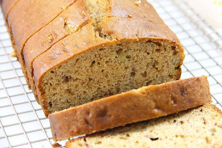This Classic Banana Bread is so easy to make! With just 2 ripe bananas and a few other ingredients this will be ready in no time! Classic Banana Bread on wire rack