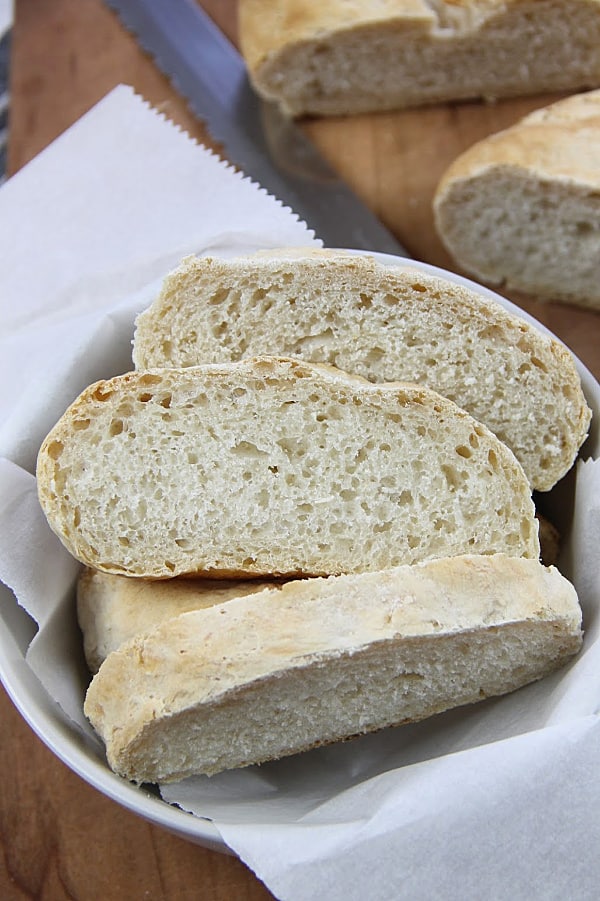 This Homemade Italian Bread is super easy to make with only 6 ingredients and very little time kneading it! Baked up in the oven for a perfect crispy bread! Homemade Italian Bread in bowl