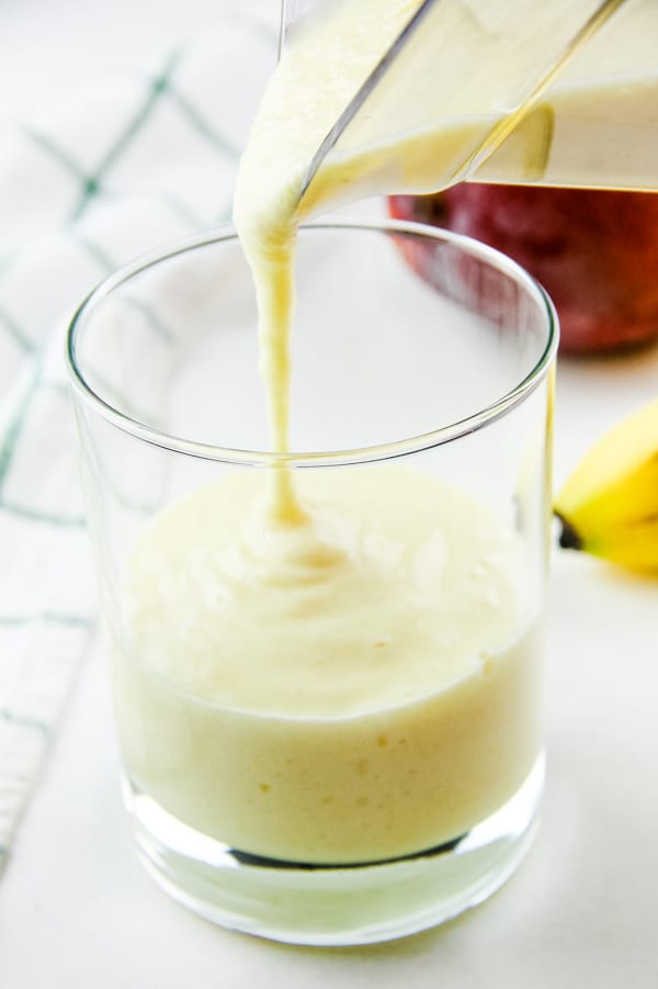 Easy Mango Banana Smoothie made with 4 ingredients! So smooth and creamy this fresh fruit smoothie is the perfect healthy snack.