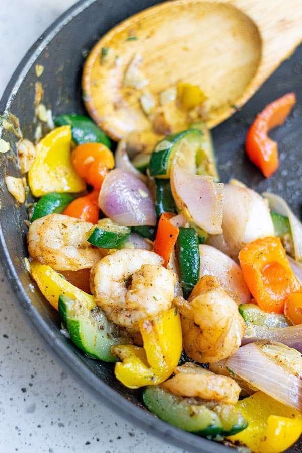 Easy Garlic Thyme Shrimp and Veggies! Cooks up in 10 minutes! This dish is loaded with lots of flavors and comes together in no time! Garlic Thyme Shrimp and Veggies in sautee pan