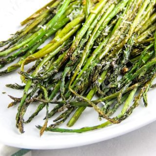 Sheet Pan Roasted Asparagus on white platter