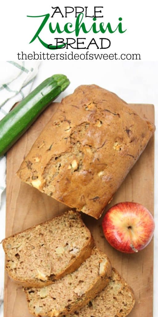 This Apple Zucchini Bread is perfectly moist! Loaded with apples and zucchini this bread is so flavorful! Perfect for breakfast or dessert! Apple Zucchini Bread on brown cutting board with apple and zucchini