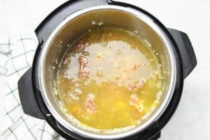 Instant Pot Sausage and Peppers Risotto with liquid in pot
