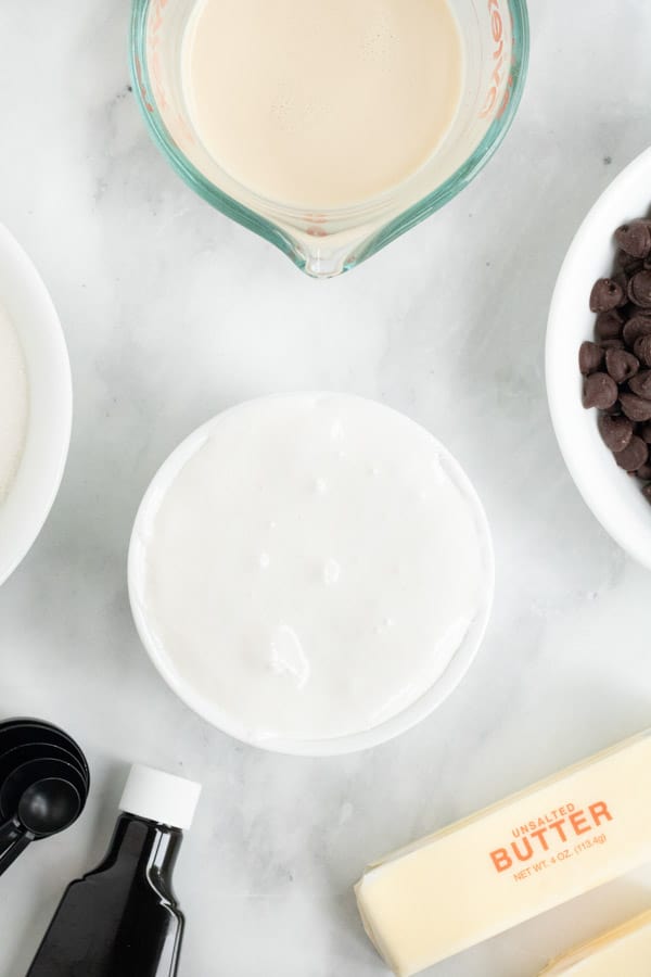 Creamy and Easy Fantasy Fudge! Made with just 6 ingredients and is nut free! Perfect candy for all occasions! Easy Fantasy Fudge Ingredients in bowls