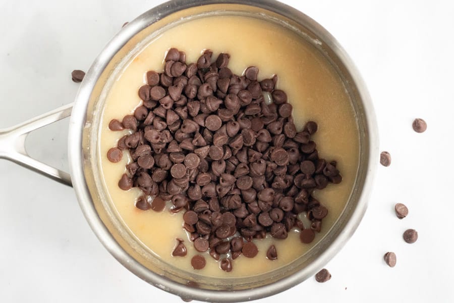 Chocolate chips added to melted milk and butter