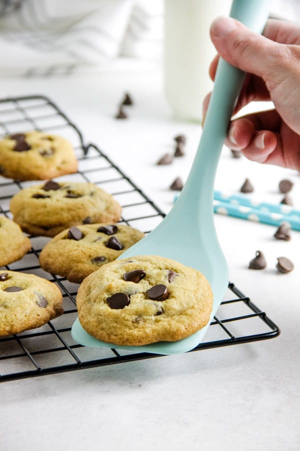 With simple ingredients these Classic Chocolate Chip Cookies bake up soft and chewy! Ready in just about 10 minutes, they will disappear fast! cookie on spatula.