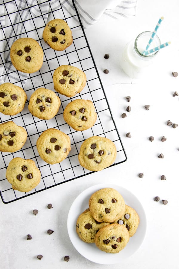 With simple ingredients these Classic Chocolate Chip Cookies bake up soft and chewy! Ready in just about 10 minutes, they will disappear fast! overhead shot of chocolate chip cookies