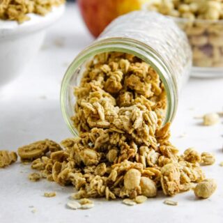 granola spilling out of mason jar.