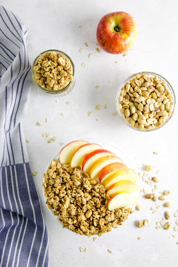 This easy Peanut Butter Granola snack is so delicious, you will be making it over and over again! Packed with peanut butter flavor! peanut butter granola in bowl.