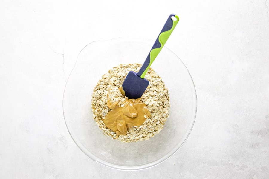 peanut butter in glass bowl with oats.