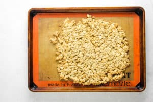 cooked granola on sheet pan.