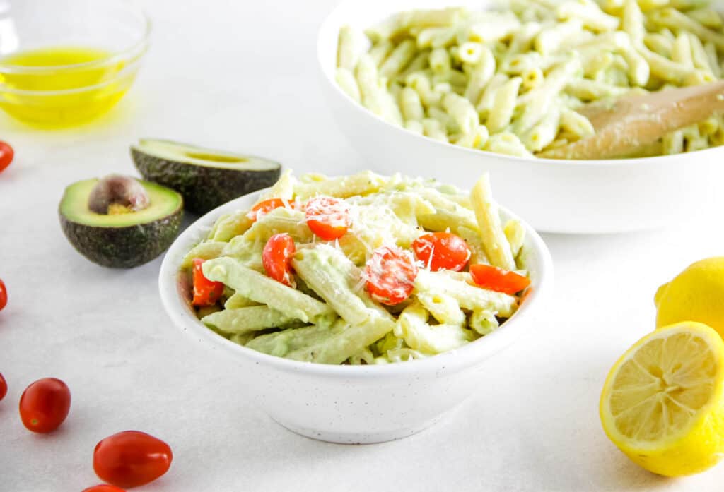 Avocado Pasta in bowl topped with cheese