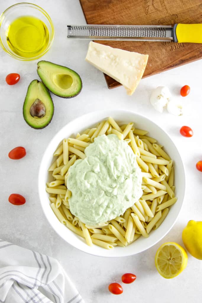This Creamy Avocado Pasta is silky, fresh, and easy to prep! Use a ripe avocado, fresh tomatoes top it over your favorite pasta noodle! Ready in less than 30 minutes, make for an easy week night meal!