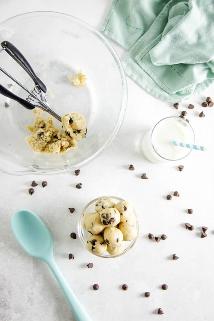 These easy no bake Cookie Dough Bites are made with a few simple ingredients! They are rolled into balls, eaten with a spoon or can be frozen! overhead view of Cookie Dough Bites.